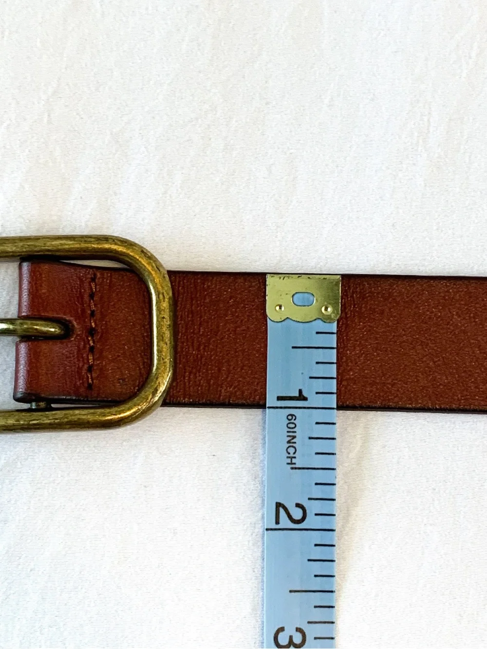 Gap leather belt in cognac red-brown color with brass tone buckle, medium